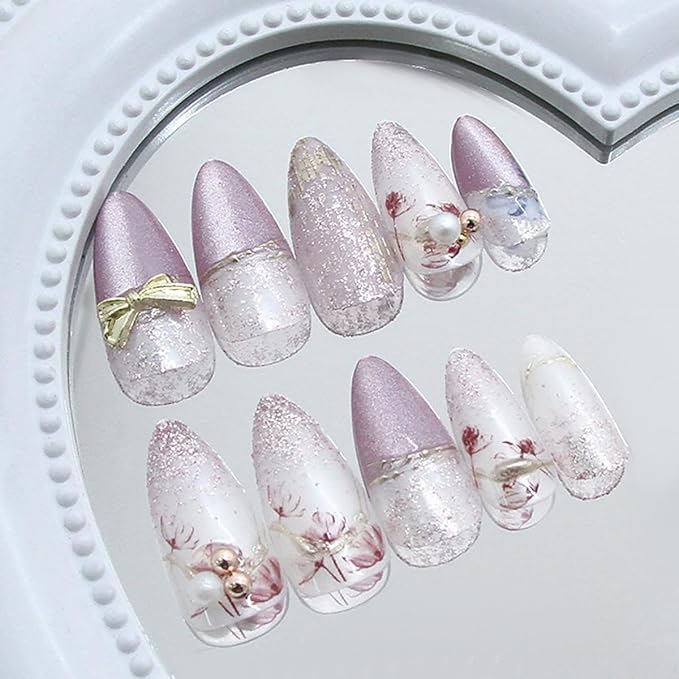 24Pcs Purple Flower Press on Nails Medium Almond Fake Nails with Pearl White Fine Sand Design Gold Bow Rhinestones False Nails Full Cover Artificial Glue on Nails Spring Stick on Nails for Women DIY