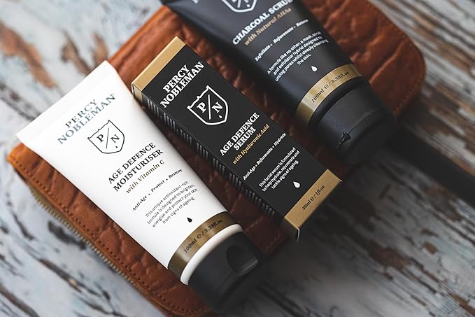 Percy Nobleman Age Defence Kit, a men's skincare set containing Charcoal Face Scrub (with Natural AHAs), ultra-hydrating Facial Serum (with Hyaluronic Acid), and Moisturiser (with Vitamin C)-VivaGrace Women