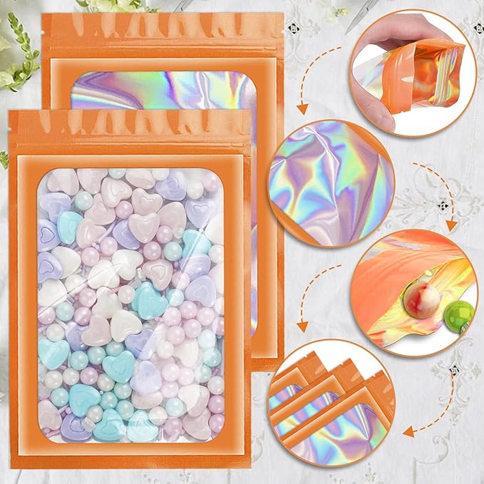 ANZNKU 100 Pcs Smell Proof Mylar Resealable Bags, Holographic Packaging Bags, Resealable Odor Foil Pouch Zip Bag with Clear Window for Food Storage and Lipgloss, Jewelry Lash (Orange, 4.7 x 7.9 Inch)-VivaGrace Women