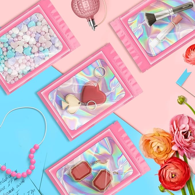 ANZNKU 100 Pack Mylar Bags Reasealable Holographic Bags, Smell Proof Bag Zipper Pouches with Clear Window, Jewelry Candy Sealable Bag for Packaging Sample Party Favor (Pink, 7.1 x 10.2 Inch)-VivaGrace Women