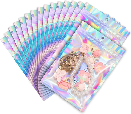ANZNKU 100 Pack Mylar Bags Reasealable Holographic Bags, Smell Proof Bag Zipper Pouches with Clear Window, Jewelry Candy Sealable Bag for Packaging Sample Party Favor(7.1 x 10.2 Inch)-VivaGrace Women